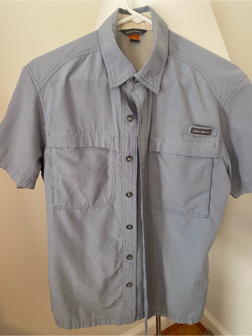 Eddie Bauer Men’s Short-Sleeve Button-Down Shirt in Light Blue.